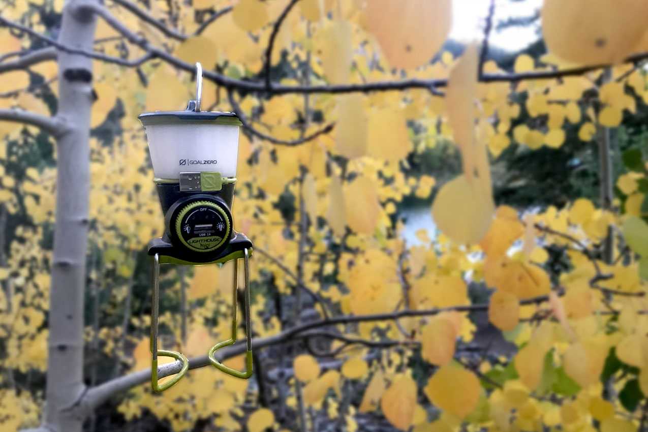 camping light hanging on a tree