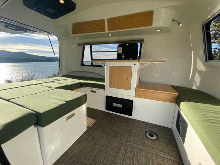 various components from couches to a bed, kitchenette and so on in the HC1