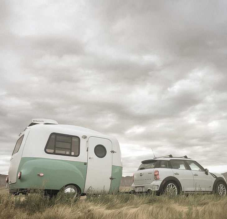 the HC1 being towed by a Mini Cooper.