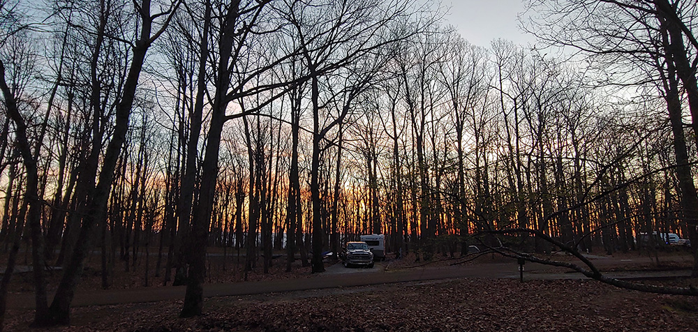 An RV camping in the woods in Alabama