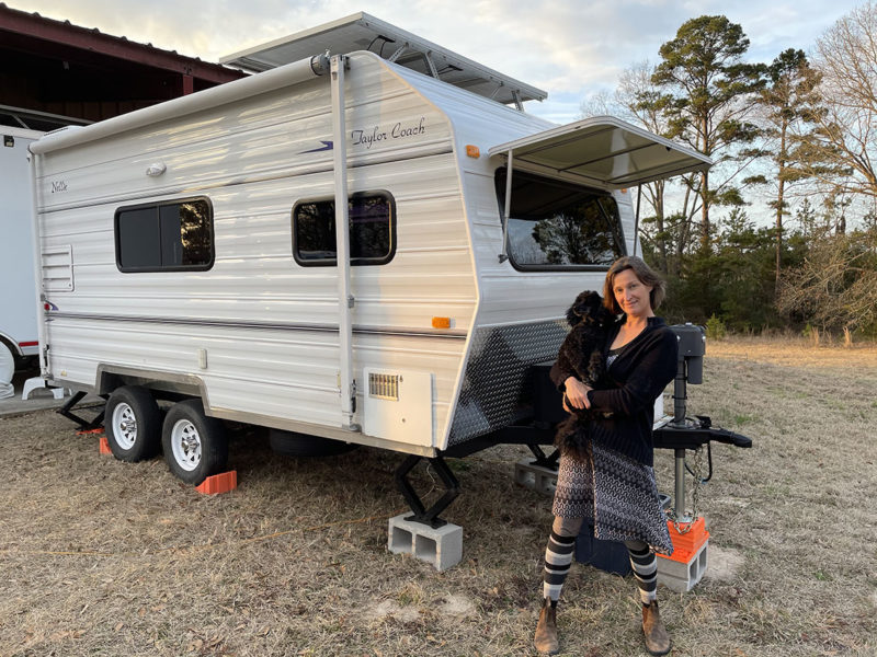 Margot and Sadie in front of their camper