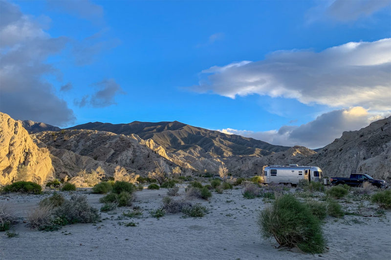 An airstream camping in the California desert.