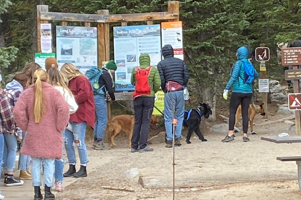 Long line of people standing in front of Brainard Kiosk.