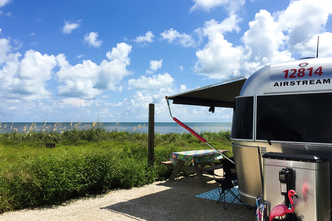 RV parked near the ocean.