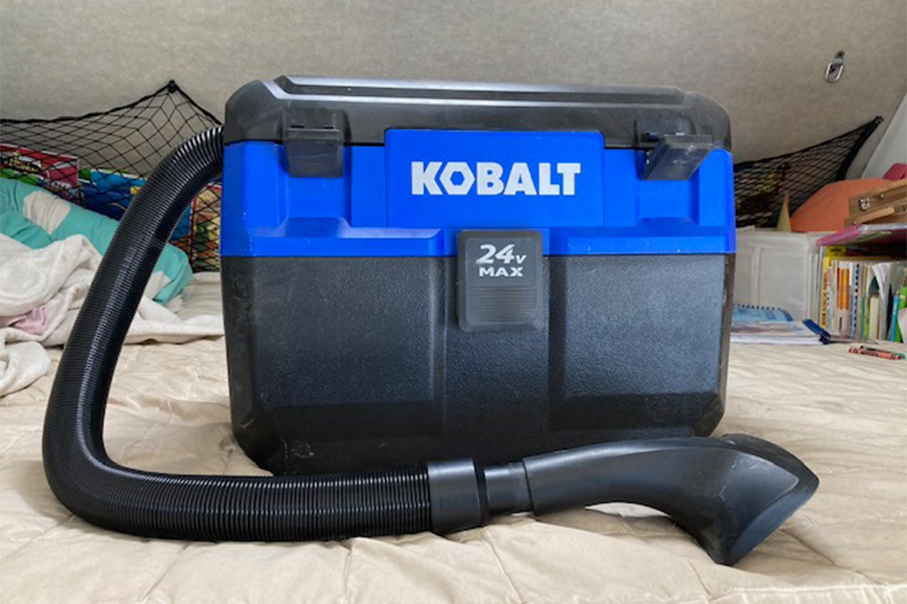Black and blue Kobalt shop vac.