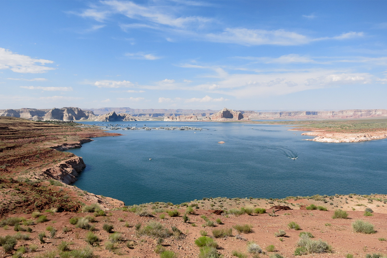 Lake in front of red rocks