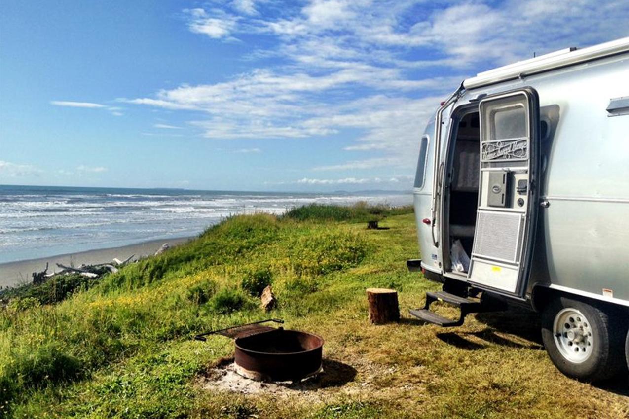 RV parked overlooking the ocean.
