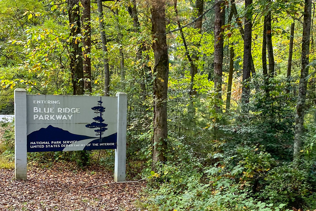 Blue Ridge Parkway sign in the woods.