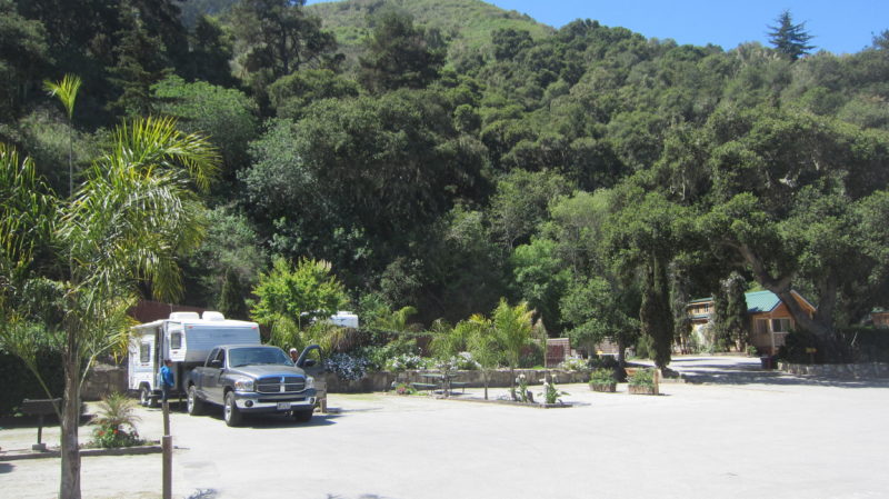 Truck with an RV on the back parked at Saddle Mountain Ranch Campground