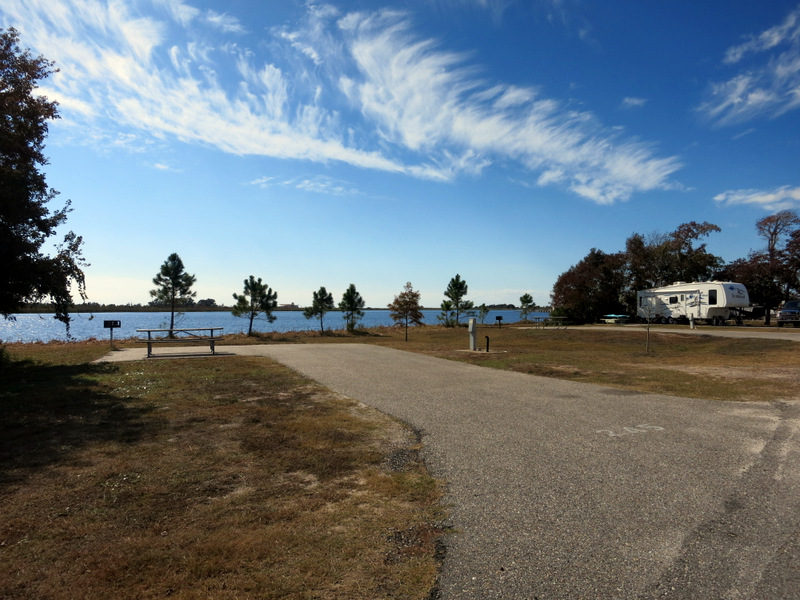View of a campground with water in the background