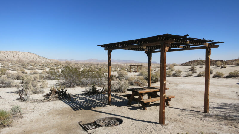 Campsite with shelter, fire ring, and picnic table