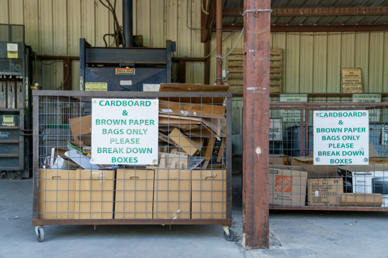 Cardboard recycling bin with cardboard and boxes inside