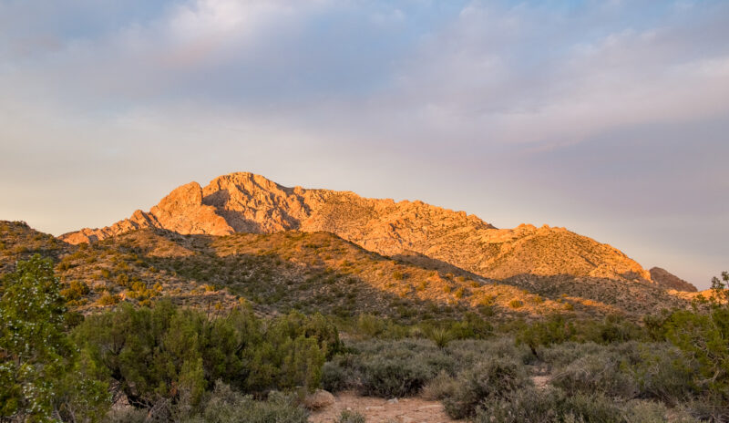 The sunset glow warms Newberry Mountains Wilderness