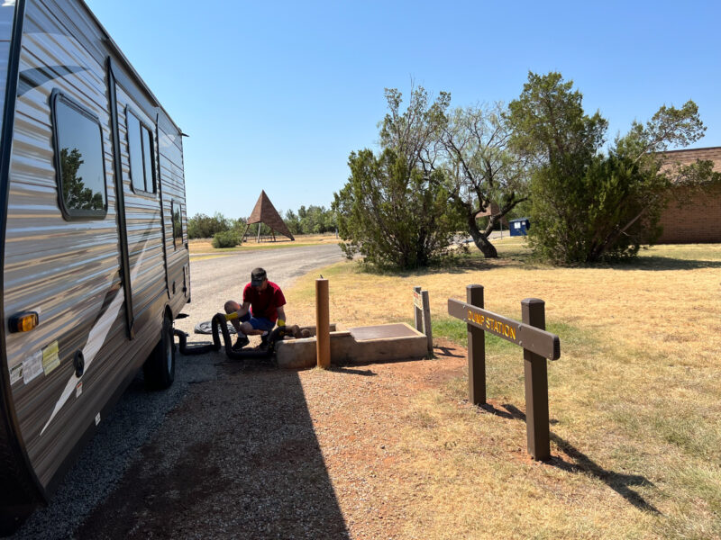 an rv parked at a dump station